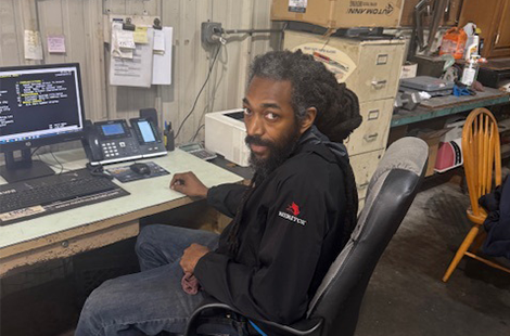 Person seated at office desk
