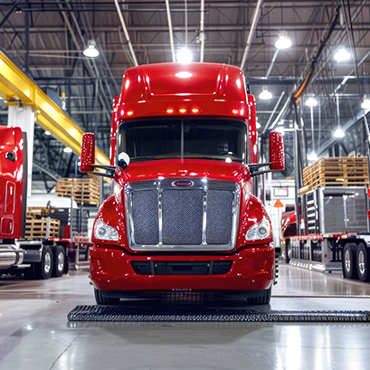 Red semi truck in garage